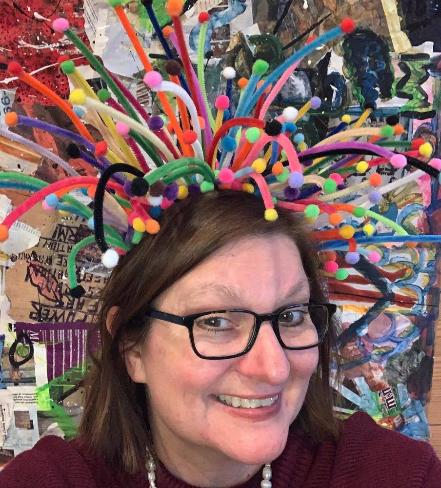Tammie Clark, in creative multicolored headband